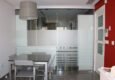 Separación de cocina y salón con cristal